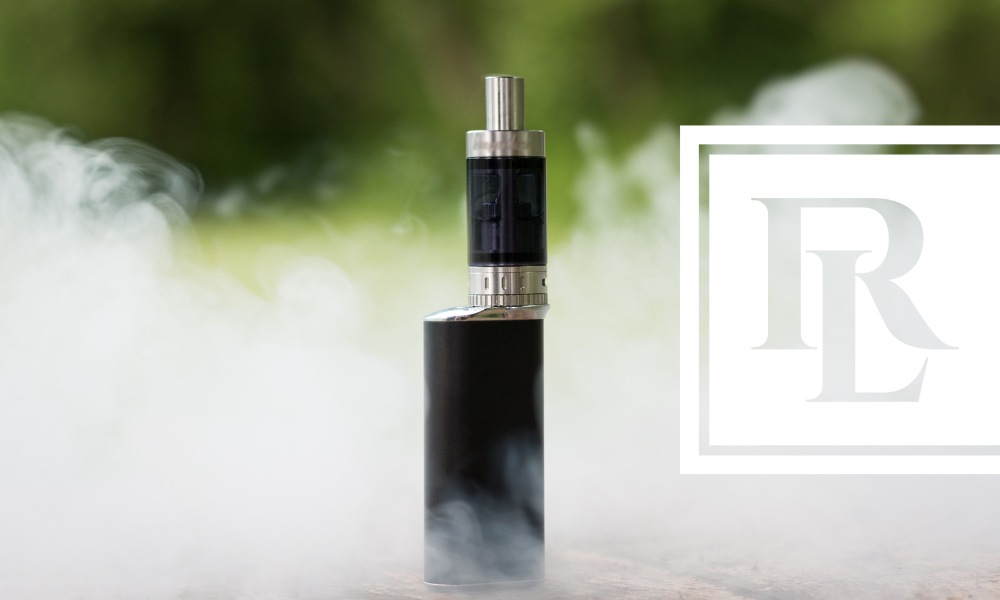 E-cigarette surrounded by smoke