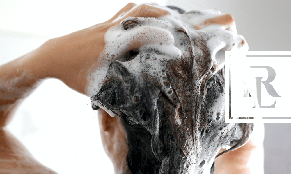 Woman shampooing hair