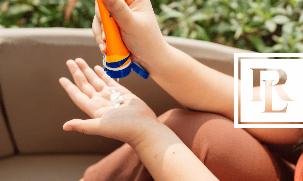 Person applying sunscreen to hand