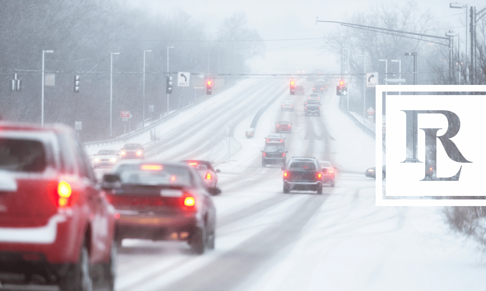 Cars driving on snow covered road