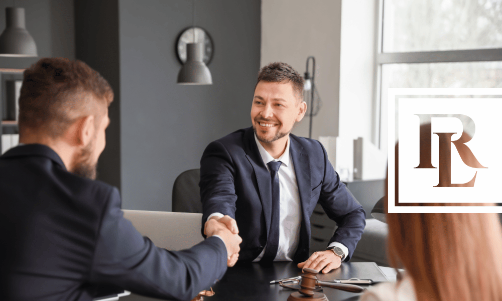 People shaking hands with a lawyer