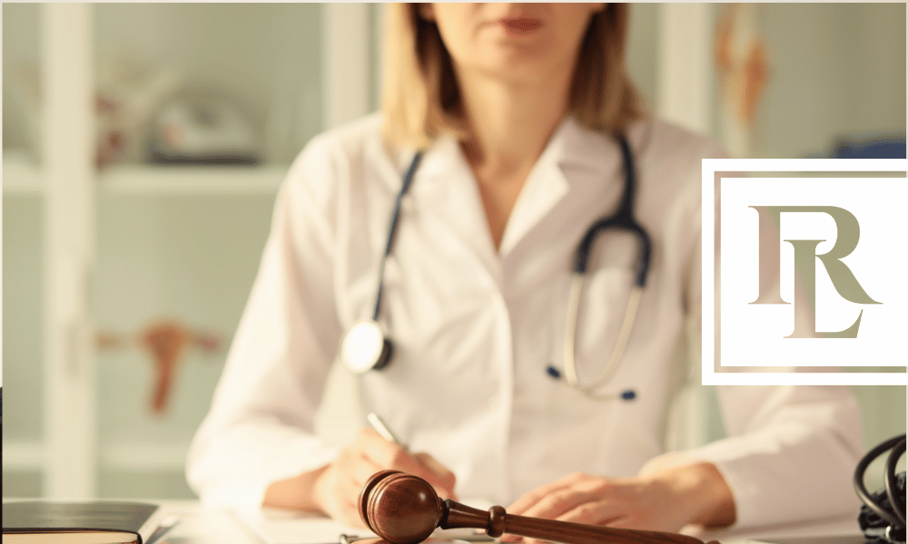 Woman doctor sitting on front of gavel