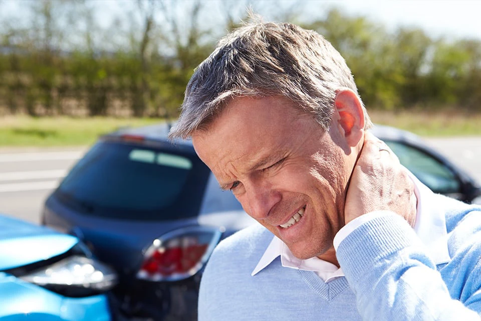 Man in pain after a car accident