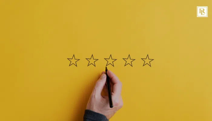 person filling out a review