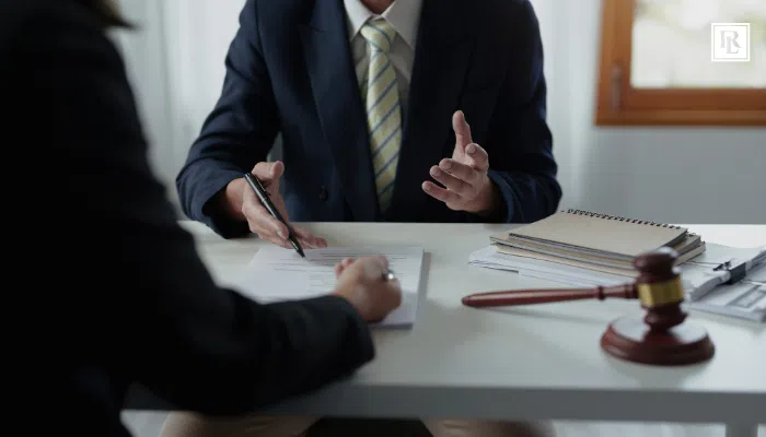 personal injury attorney talking to client
