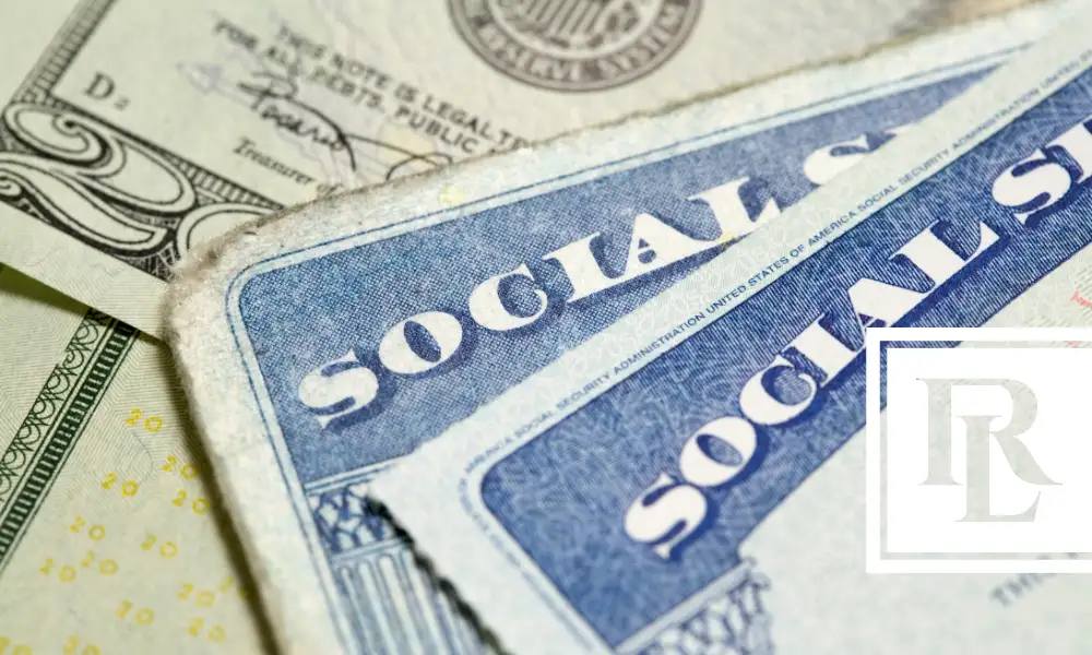 Social Security cards on top of $20 bills
