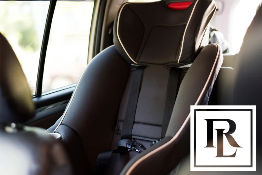 Child's car seat in the backseat of a vehicle